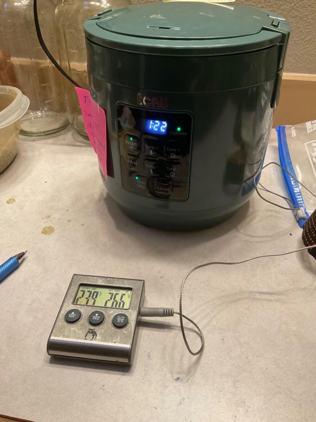 Customer photo: decarboxylator with a probe thermometer logging the run
