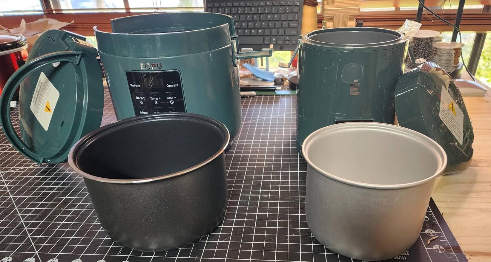 Customer photo: two ÉCRU units with their non-stick pots in front