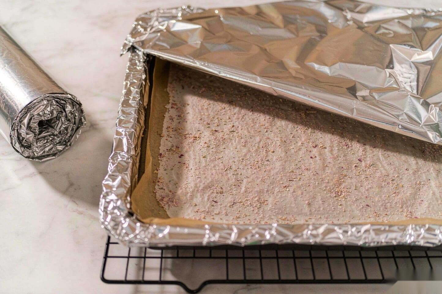 Baking sheet covered tightly with aluminum foil